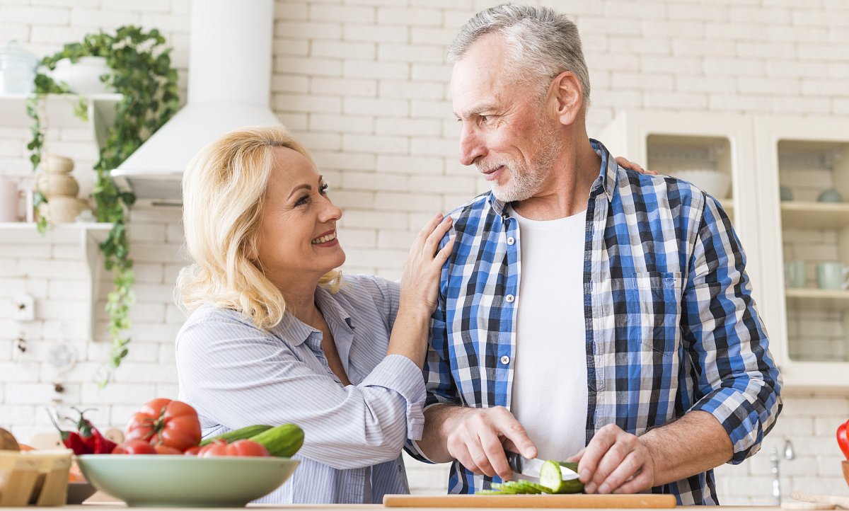 happy-portrait-senior-couple-preparing-food-kitchen.jpg